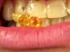 i'm watching fifi foxx eat gummy bears up close with mouth vore