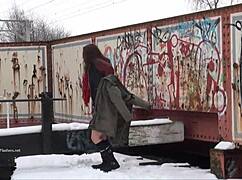 Coed nude in public university snow