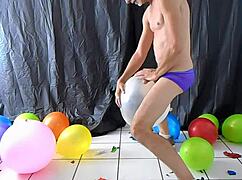 richard lennox, horny gay dilf, indulges in balloon play with monster cock.