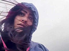 A busty young girl flashes her big ass and tits on the public beach, getting caught