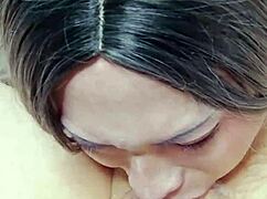 Crossdresser handling giant dick with blowjob