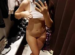 Sexy Girl Fingered to Orgasm in Public Fitting Room