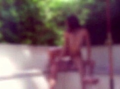 Oiled Bodybuilder Milf Enjoys Outdoor Activity