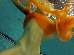 Nastya strips bare and flaunts hot naked body in pool