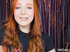 This redhead blows herself on webcam.