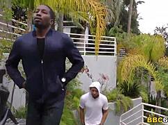 Leya Falcon in group scene with black performers