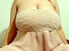 hottie in chic dress plays with big breasts publicly