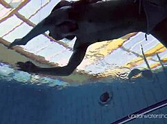 Roxalana Cheh Poses As Sexy Redhead Underwater