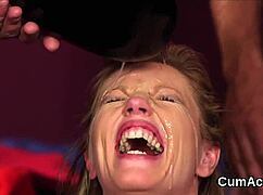 Unusual hottie receives cum shot on face, gulping all the cum in blowbang POV