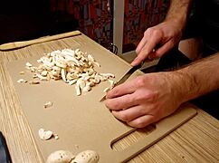 Naked Gay Chef Prepares Rice Noodle with Chicken and Vegetables in Kitchen