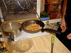 Naked Gay Chef Prepares Rice Noodle with Chicken and Vegetables in Kitchen