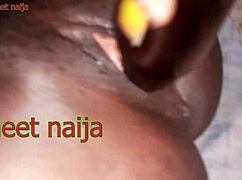 Ghana ebony girl fucks malt bottle with her ass!