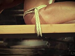 this hot blonde gets bound tight in the garage. she’s spanked hard as a naughty bdsm slave!