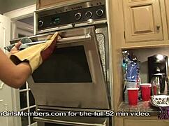 Cooking naked in kitchen with Raquel showing off huge natural tits