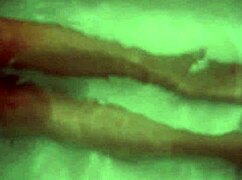 in the hotel bath, two redhead lesbians kiss and lick each other's natural tits