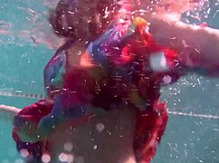 why does redhead b nikita vodorezova get naked so fast underwater on the public beach