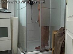 Stepson secretly watches stepmother in morning shower while masturbating in taboo family clip