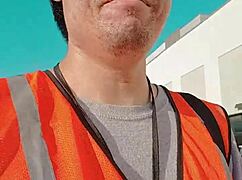 an asian woman casually walking around outdoors during her work shift