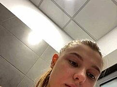 A teen fingers her pussy to orgasm in public outdoor spot