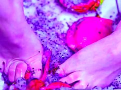 Bare toes crush juicy fruit in a wet, dirty solo fetish. 😋