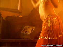 check out this naked brunette striptease, beautiful oriental girl teasing with ripped clothes and exotic music