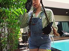 The girl is a good gardener but also a gorgeous teen in the garden.