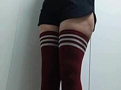 cheeky chick tries on tops topless in change room without panties