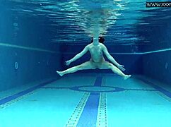 lady dee is such a cute shy czech teen swimming with her small tits.