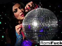 Romi teases with disco ball before slamming toy in pussy