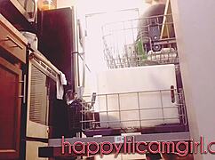 tall girl dominates kitchen cleaning while recording voyeur webcam.