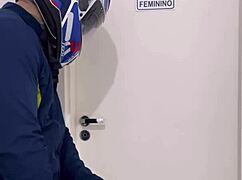 Motoboy bursts into women's bathroom, fucks peeing woman who cums hard on his monster cock.