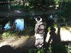 look at that hairy mature flashing her pussy in the park