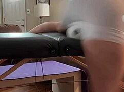 groin stretch in tight spandex shorts with ball on stool and table time lapse
