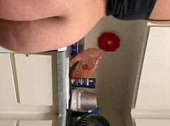 The redbone bends over in the kitchen for a big black cock doggystyle.