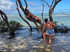 Two gorgeous girls enjoying the beach at enseada dos corais in cabo, pe, with kissing and outdoor fun.
