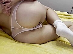 Oh, look at this hot girl teasing her pussy right on the bed!