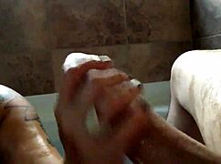 Mom gives amazing handjob to big cock in bathtub 😍