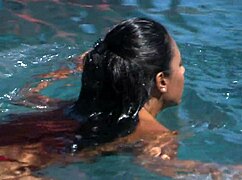 Dee Massages By The Pool In Outdoor Interracial Scene