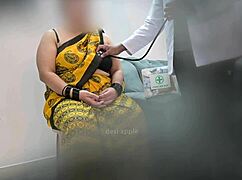 Doctor examines Asian Indian patient in hospital clinic 😊