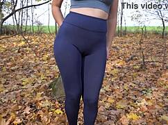 Girl in yoga pants teases her fat cameltoe outdoors 😏