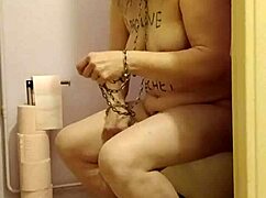 Slave Self-Belts And Licks Toilet