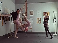 Submissive bondage puppet Rebel Rhyder sucks cock and eats ass in a demented threesome game