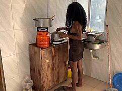 Newly married couple having passionate sex in the kitchen