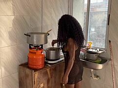 Newly married couple having passionate sex in the kitchen