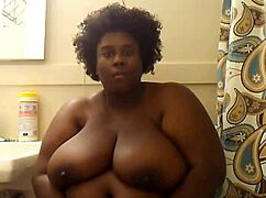 Indiana woman goddess indulges in self-masturbation, playing with her big tits and mature body.