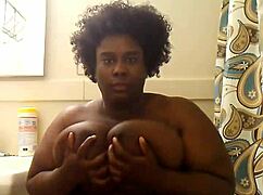 Indiana woman goddess indulges in self-masturbation, playing with her big tits and mature body.