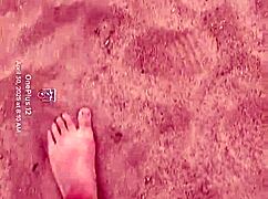 bare feet play in the sand