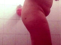 Voyeur adventures with busty wife showering to show off