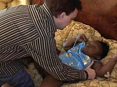 Black Midget Teases With Big Tits And Nipples