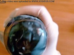 teasing handjob on huge black dildo using sexy gloves